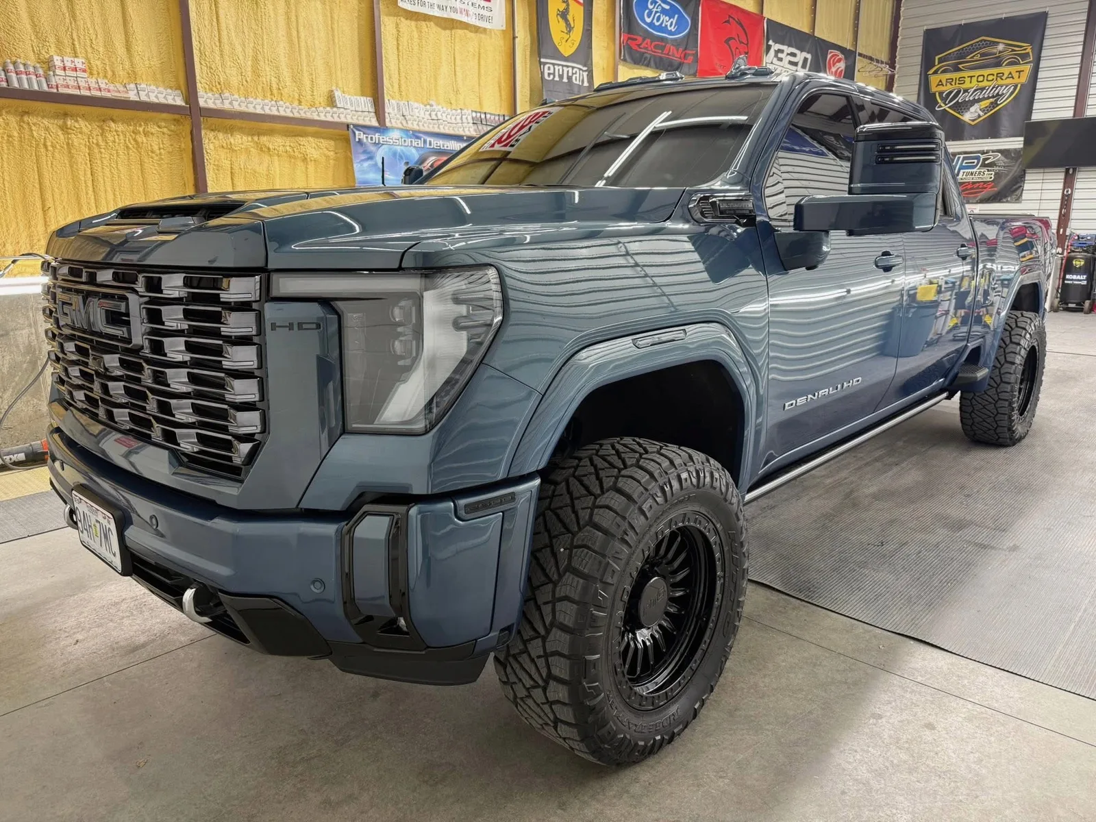 GMC Sierra Denali HD lifted in blue