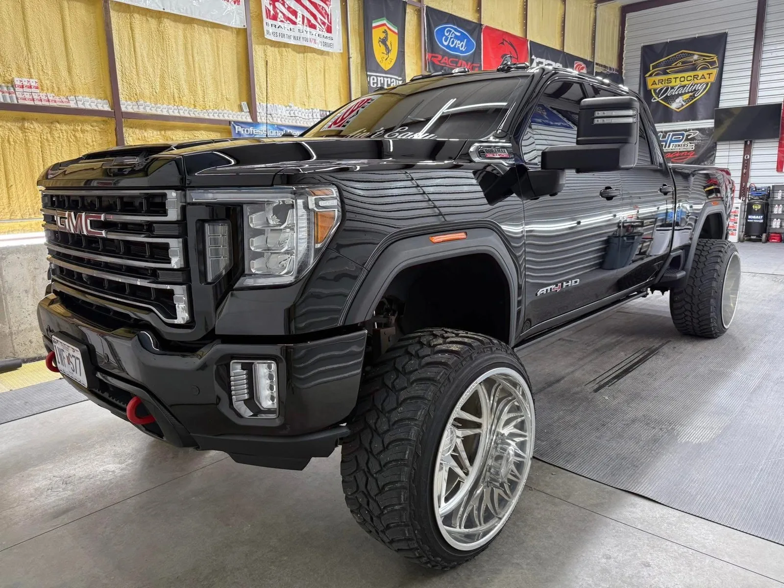 GMC Sierra AT4 HD with chrome wheels lifted
