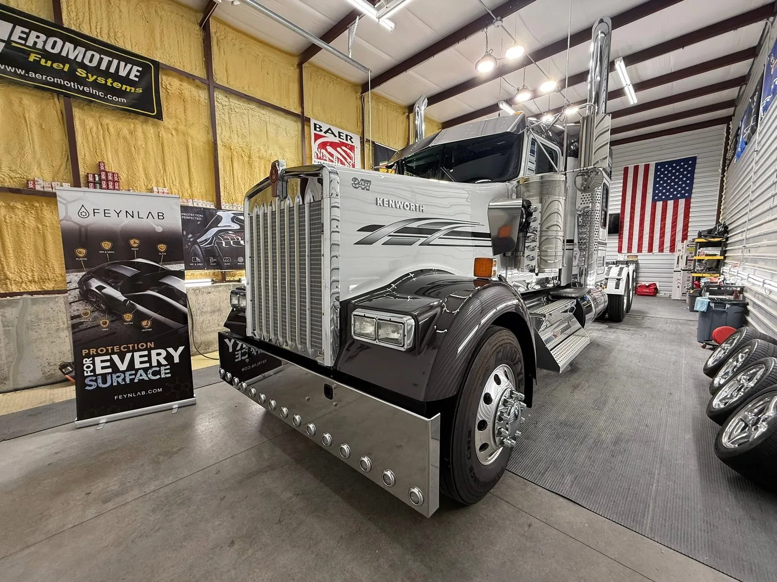 Kenworth W900 semi truck ceramic coated black and silver