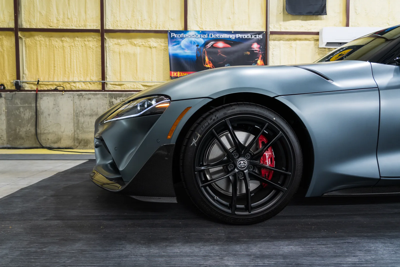 Toyota Supra wheel and front fascia detail